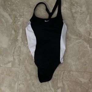 White and black open back Nike swimsuit